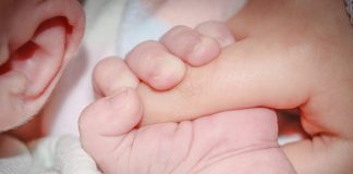What causes sudden infant death syndrome