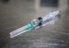 An image of a syringe to depict sparities in immunization rates exist in the USA.