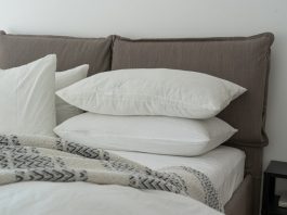 pillows stacked on a bed