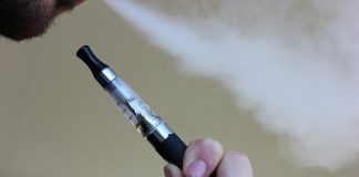 person smoking e-cigarette