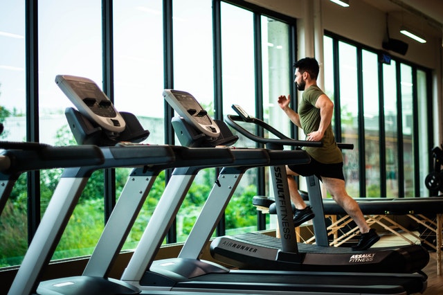 man running on treadmill