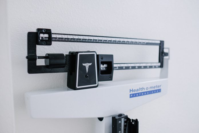 New weight loss products are always coming out to try to combat the rising crisis of obesity. This image shows a scale at a doctor's office, which is where you should get more information on whether these products are right for you.